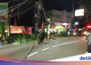 LKW verheddert sich in Elektrokabeln in Pondok Ranji, Stau